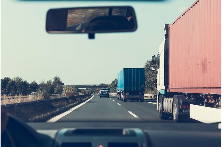 highway-road-trucks-windshield